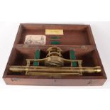 A brass surveyors level, circa 1800-1820, in a mahogany case,