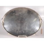 A twin handle pierced gallery tray on bun feet inscribed 'Thorley's Special Prize', length 52cm,