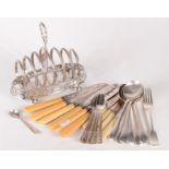 A Victorian beaded, pierced and engraved silver plated toast rack and a little cutlery.