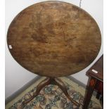 A George III oak tripod table,