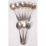 Nine various Old English pattern silver dessert spoons, 9.5oz.