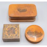 Two Mauchline ware boxes, Hatfield House, width 12cm and The Pavilion Brighton, diameter 7.