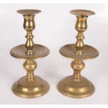 A pair of Dutch Heemskerk brass candlesticks,