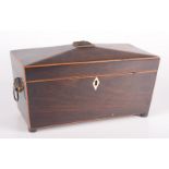 A Regency mahogany tea caddy with gilt metal lion mask handles and floral finial, height 17cm,