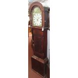 A mahogany 30 hour longcase clock, early 19th century, the painted arched dial signed E.