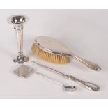 A small silver engine turned Art Deco compact, a Russian style spoon,