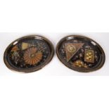 Two Victorian oval tin trays, mother of pearl inlaid and gilt painted with flowers,