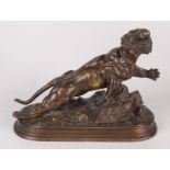 A French bronze figure of a wounded tiger, 19th century, signed J. Hesteau, height 18cm, width 24cm.