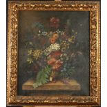 A Dutch style oil of flowers on a shelf, acanthus moulded frame, 68 x 57cm.