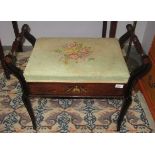 A late Victorian or Edwardian marquetry and rosewood veneered piano stool, with a music compartment.