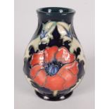 A Moorcroft pottery 'Poppy' pattern vase, shape 7, by Rachel Bishop,