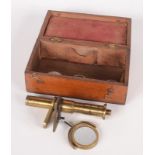 A small brass botanical microscope, by R. Field & Son, Birmingham, height 12cm, in a mahogany case.