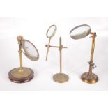 A brass adjustable magnifying glass on stand, late 19th century,