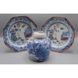 A pair of Chinese porcelain shallow bowls, 18th century, each decorated with a river scene,