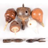 Five various spinning tops, 19th century, including treen and ivory examples, largest height 12cm.