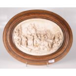 A composition oval wall plaque, 19th century, depicting a military parade, in an oak frame,
