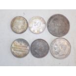 Six World silver coins.