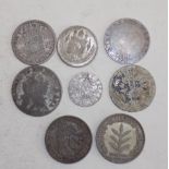 Eight 17th to 19th century World silver coins, worn or dark.