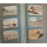 A large Edwardian album containing approximately 500 postcards including silks Japanese hand