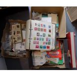 World stamps etc and a quantity of cigarette and trade cards contained in three boxes.