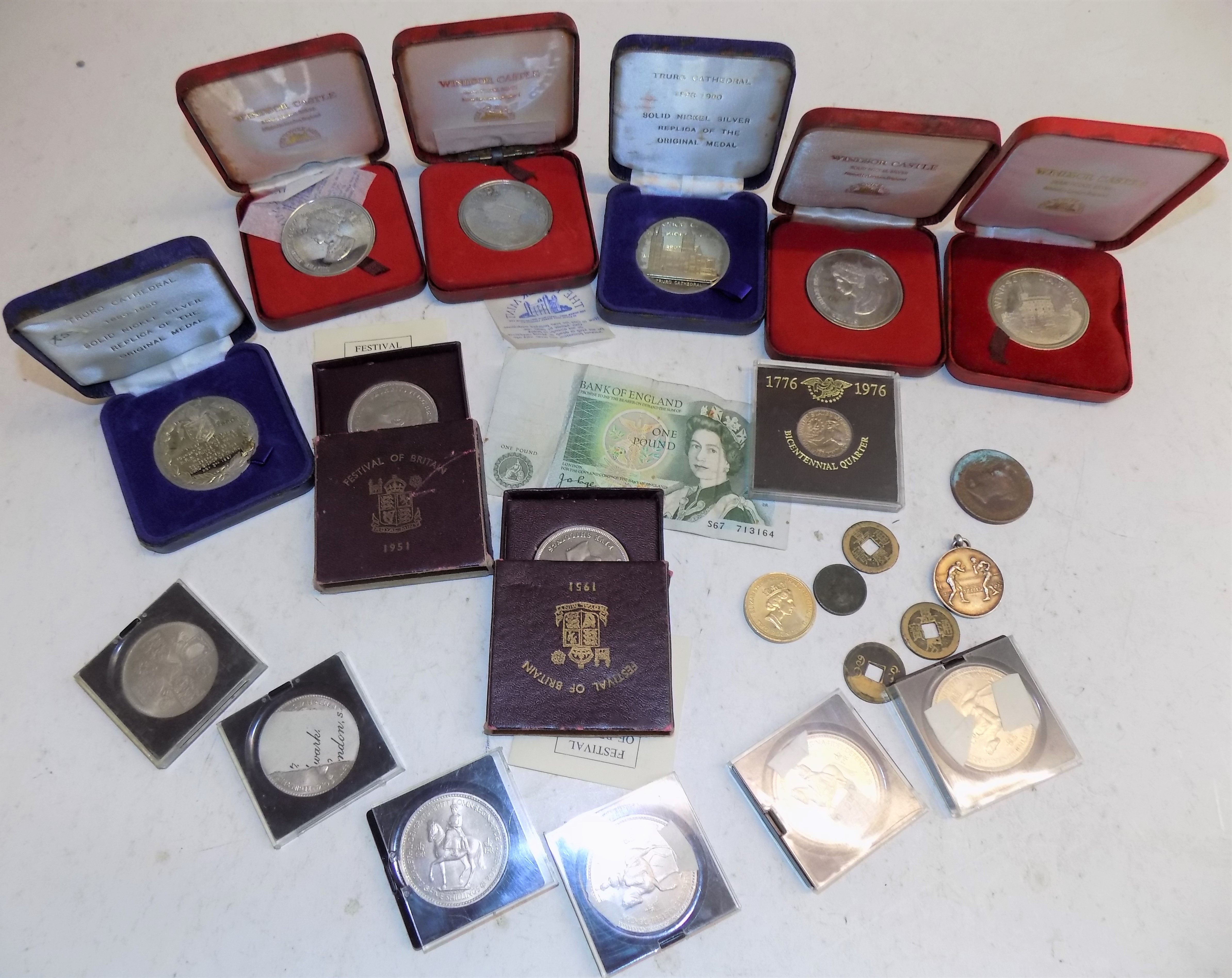 A silver boxing medal, two 1951 crowns, nickel medallions, six 1953 crowns etc.