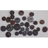 A collection of mostly later Roman bronze coins.