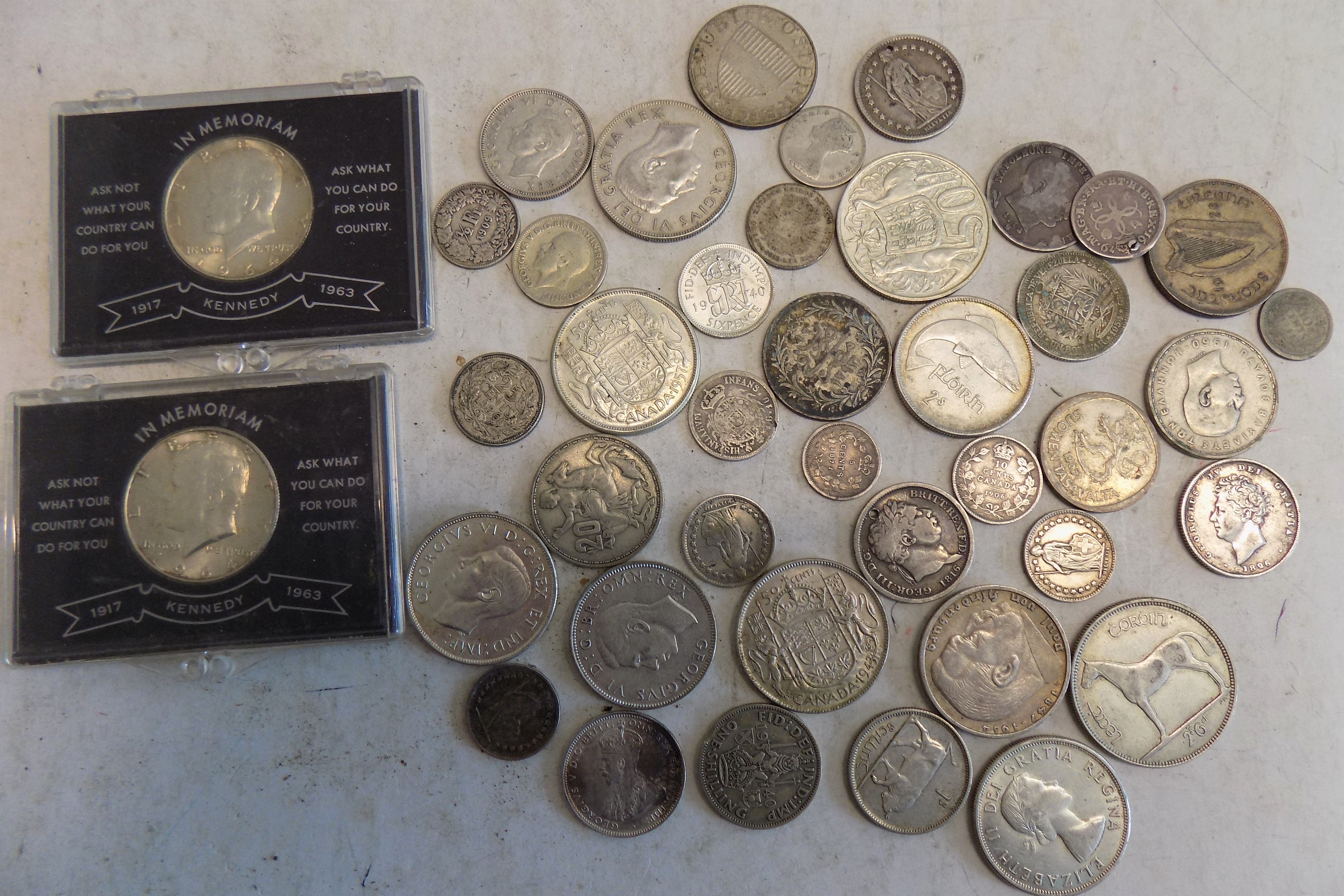 Two U.S.A. 1984 half dollars together with British and Foreign silver etc.