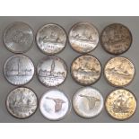 Canada:- Twelve silver dollars.