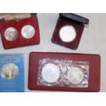 Ireland:- 2 10/- silver coins cased as one, two Iceland silver coins cased,