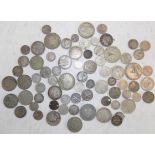 A collection of mainly silver world coins.