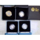 Three proof silver £1 coins, 2001, 2002 and 2009, together with a proof silver £2 2001,