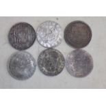 Six crown size 17th to 19th century silver coloured European coins probable copies,