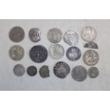 A small collection of silver and other coins.