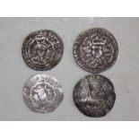 Edward IV half groat together with three other worn coins.