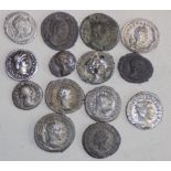 Fourteen silver and other Roman coins.