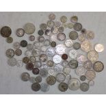 A collection of mainly foreign silver coins.