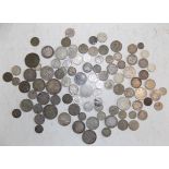 A collection of mainly foreign silver coins.