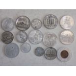 Fifteen 19th or 20th century alloy tokens.