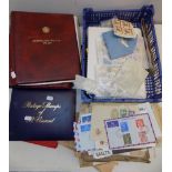 A quantity of postal history, together with loose stamps and empty albums.