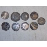 Nine hammered coins:- including Elizabeth and James, worn.