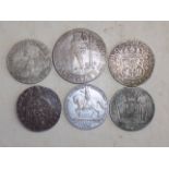 Six crown size 17th to 19th century silver coloured European coins probable copies,