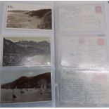 A modern album containing postcards early to modern.