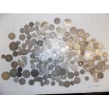 A quantity of mainly foreign silver coins.