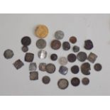 A collection of various coins including hammered, early milled and copies.