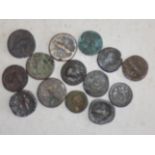 A collection of earlier Roman coins worn.