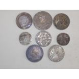 Eight 17th to 19th century World silver coins, worn or dark.