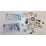 2/6d 1892, modern £5, bank notes and a small quantity of silver coins.