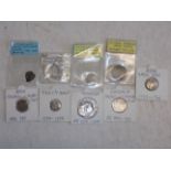 A collection of World coins each identified.