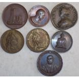 Seven bronze and other medallions including Queen Anne.
