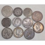 Eleven silver and other World coins, somewhat worn and darkened.
